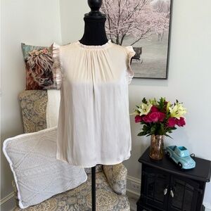 Cream Sleeveless Ruffled Blouse